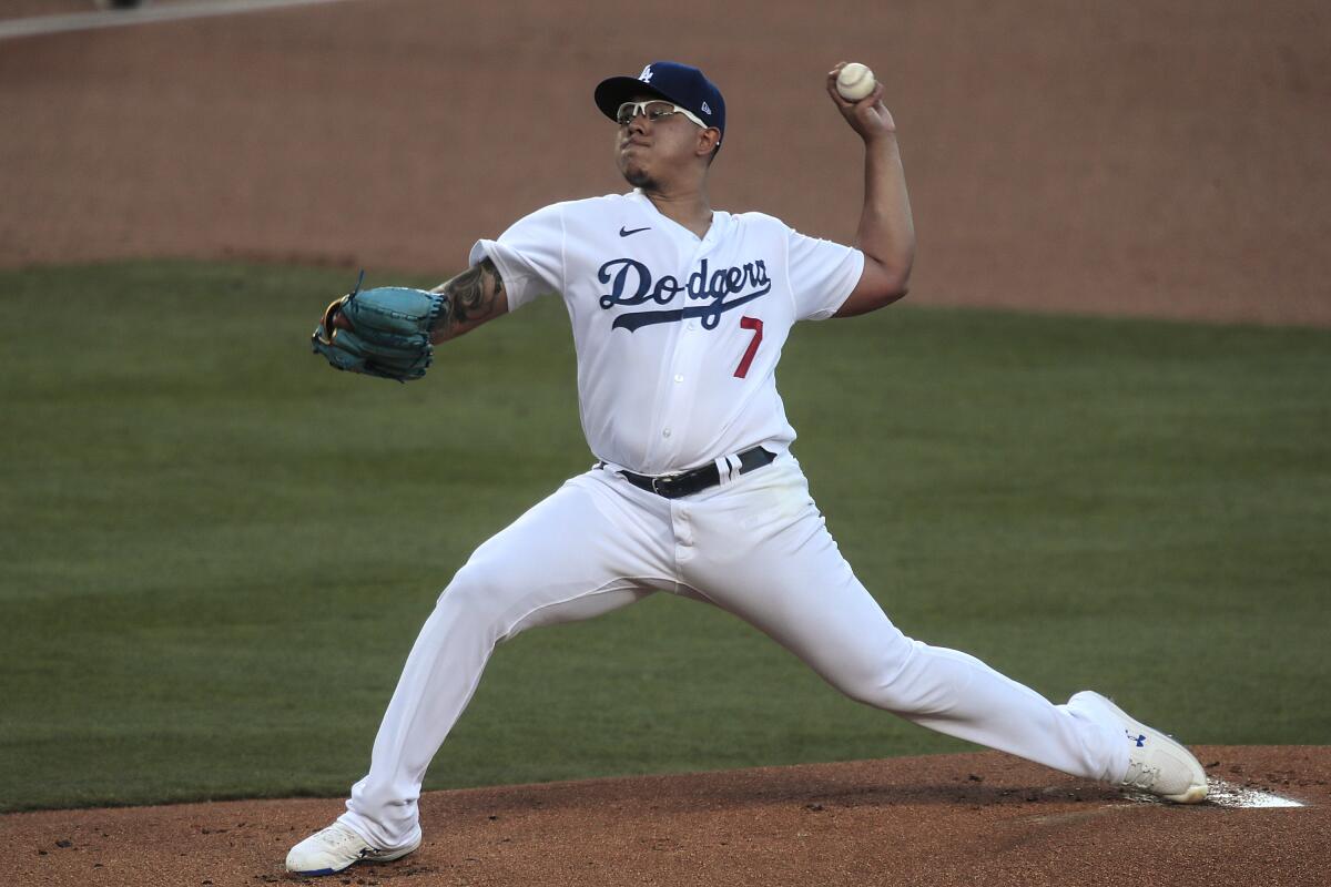 Dodgers starter Julio Urías delivers during the first inning.