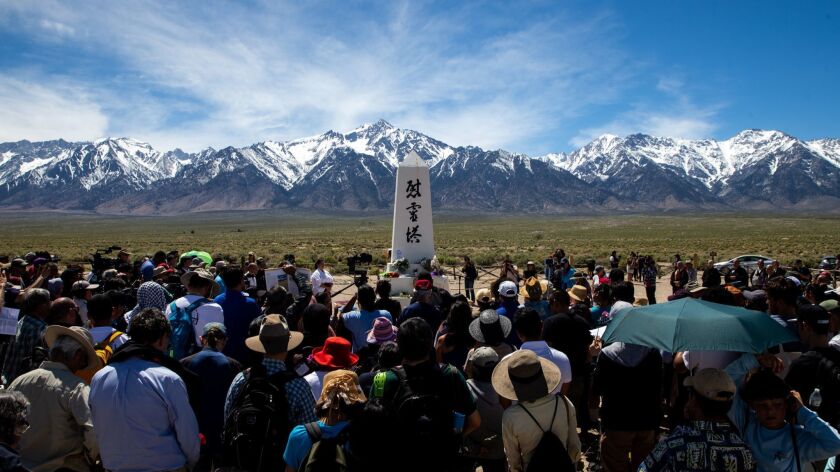 People take part in the annual Manzanar Pilgrimage at the Manzanar War Relocation Camp in Independence, Calif., on April 27.