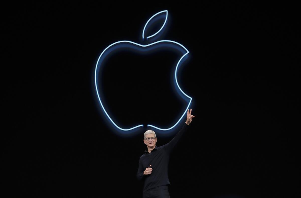 Apple CEO Tim Cook waves after speaking at the Apple Worldwide Developers Conference in San Jose in 2019.