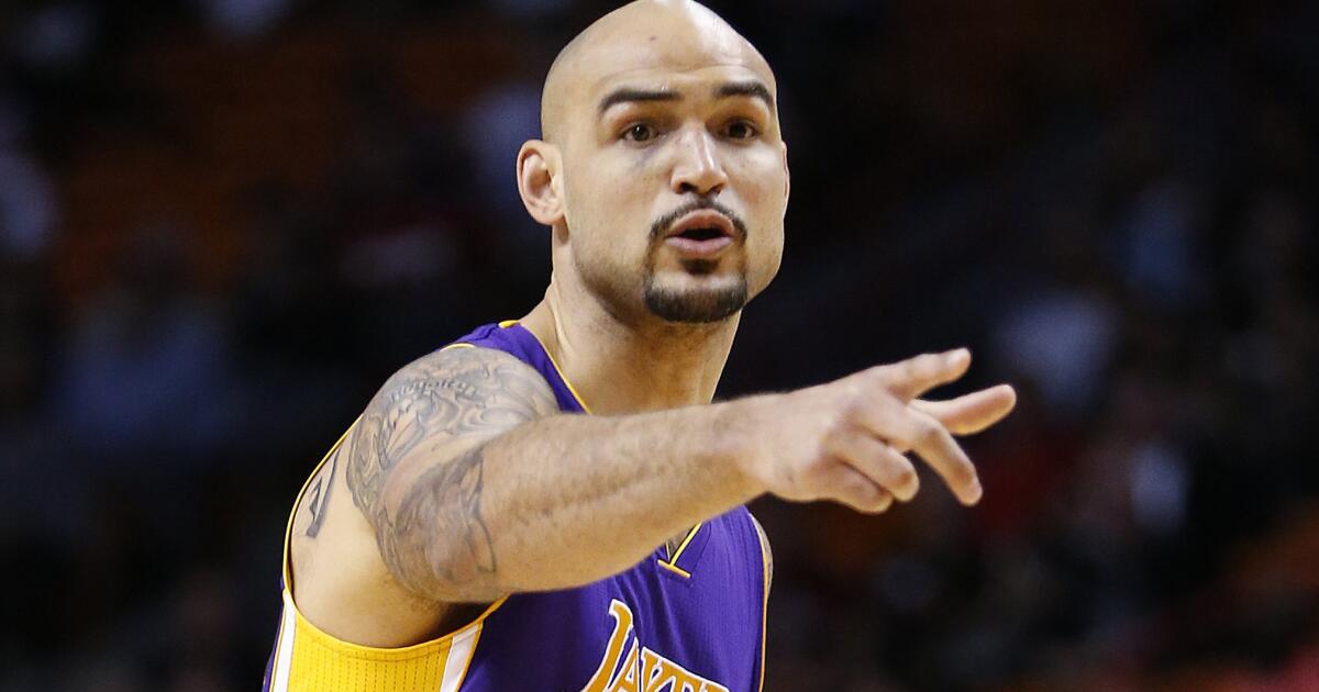 Robert Sacre of the Los Angeles Lakers sports tattoos during the game  News Photo - Getty Images