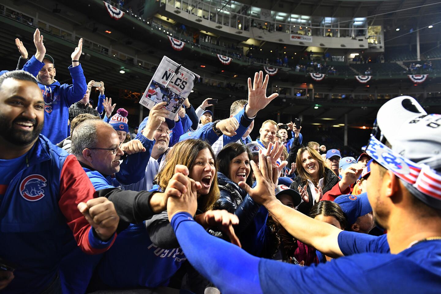 Cubs feel the passion of an entire city as they earn a trip to the World  Series - Los Angeles Times