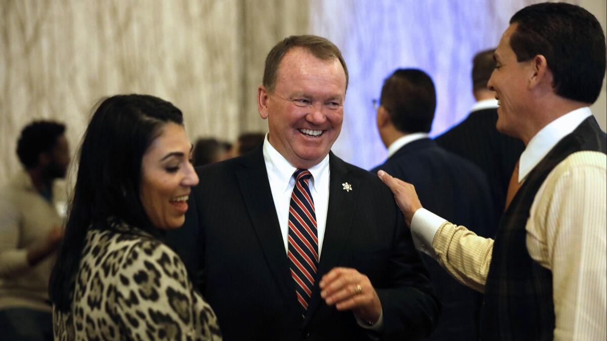 Los Angeles County Sheriff Jim McDonnell greets supporters on election night at the JW Marriott at L.A. Live.