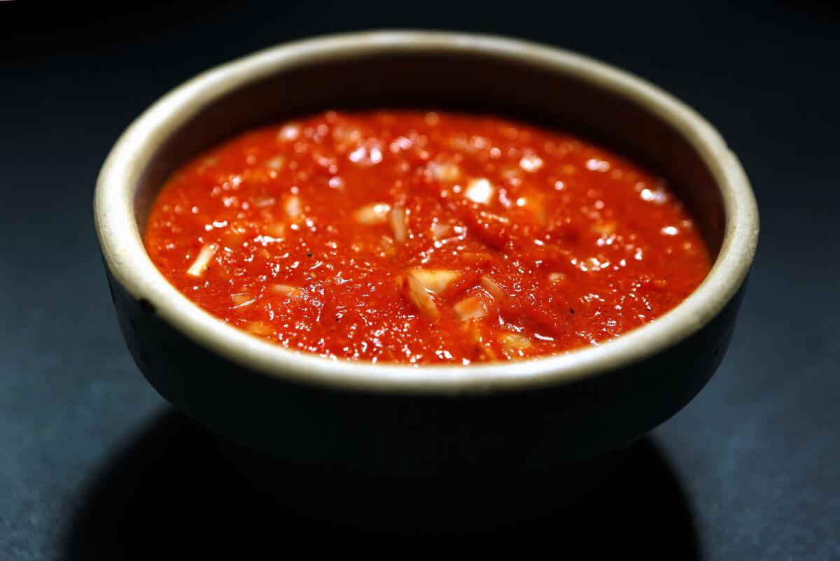 Druze secret sauce (roasted red pepper purée with onion shards)