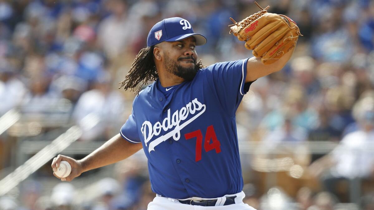 Dodgers closer Kenley Jansen pitches during an exhibition game against Seattle on March 9.