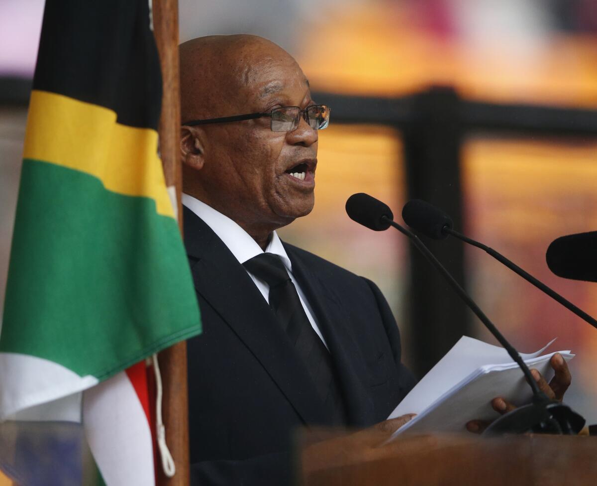 South African President Jacob Zuma speals at Nelson Mandela's memorial service in the Johannesburg township of Soweto.