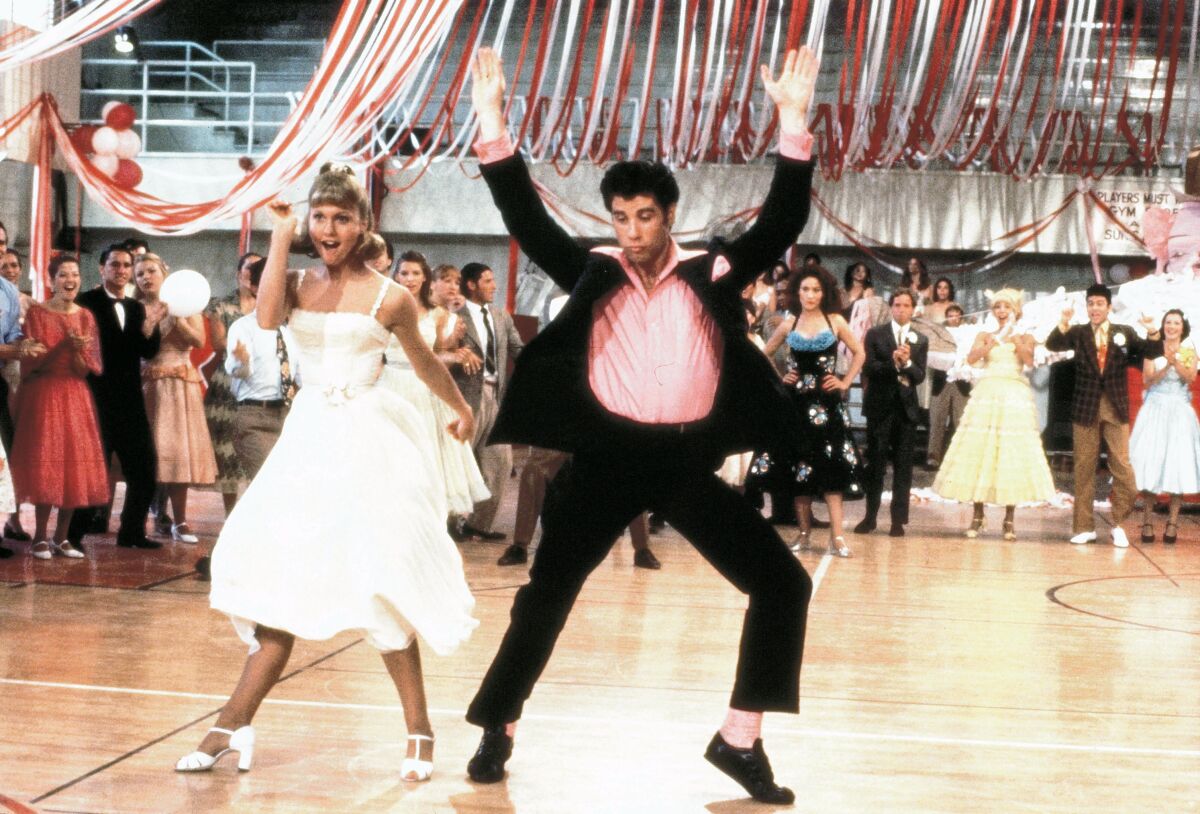 Olivia Newton John, left, and John Travolta in a scene from the 1978 film "Grease." 