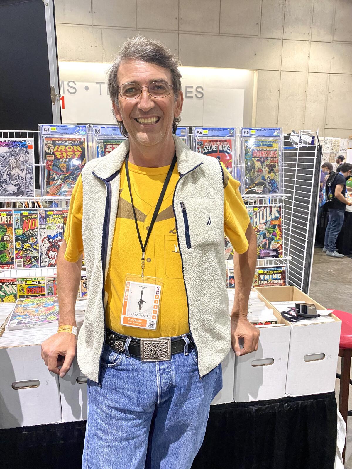 Cal Burke of McFlys Comics in Huntington Beach stands at his booth at Comic-Con 2022 in San Diego on July 24.