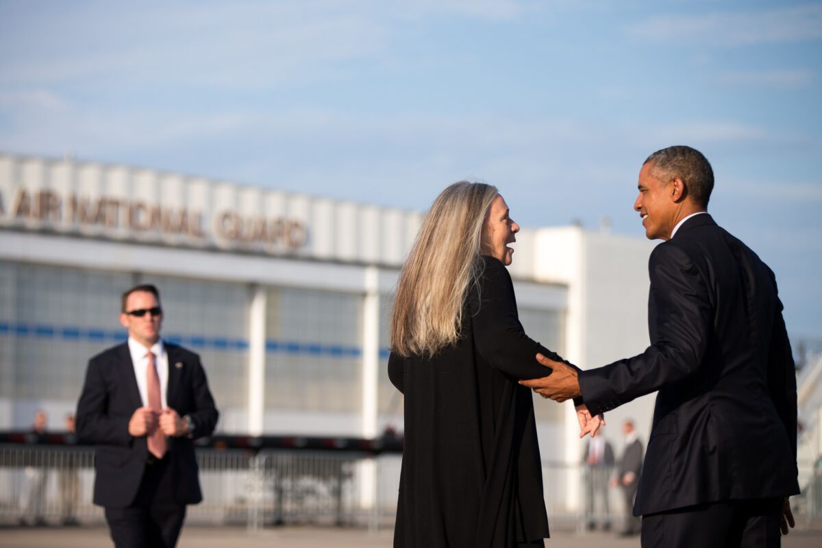 Writer Marilynne Robinson with President Obama after he interviewed the novelist.