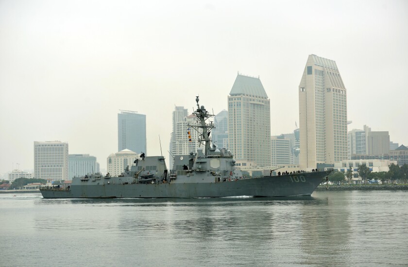 The guided-missile destroyer USS Kidd (DDG 100) arrived in San Diego Tuesday as part of the Navy’s response to the COVID-19 outbreak on board the ship. The Navy will provide medical care for the crew and clean and disinfect the ship. (