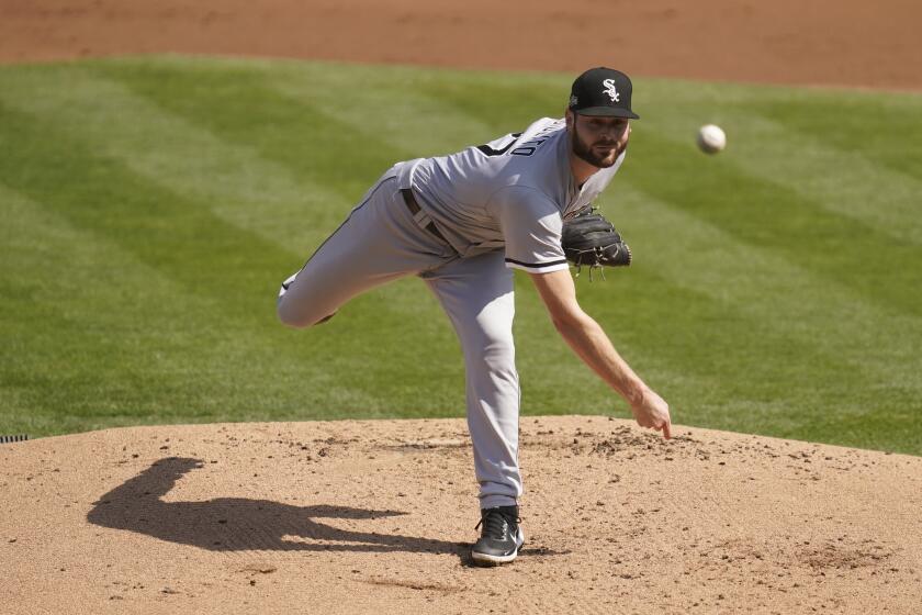 Chicago White Sox pitcher Lucas Giolito throws against the Oakland Athletics during the first inning of Game 1 of an American League wild-card baseball series Tuesday, Sept. 29, 2020, in Oakland, Calif. (AP Photo/Eric Risberg)