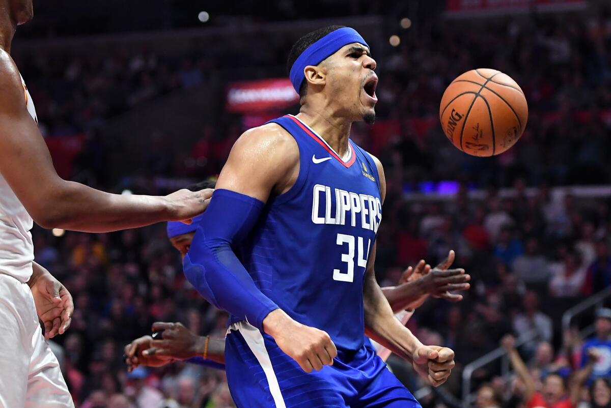 Clippers' Tobias Harris celebrates his dunk against Indiana on April 1.