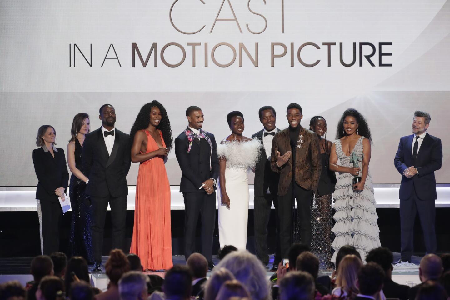 The cast of "Black Panther" accepts the prize for Outstanding Performance by a Cast in a Motion Picture onstage during the show at the 25th Screen Actors Guild Awards at the Shrine Auditorium and Expo Hall.