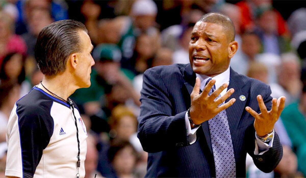 The Clippers and the Celtics have been in trade negotiations that could send Coach Doc Rivers, right, to L.A.