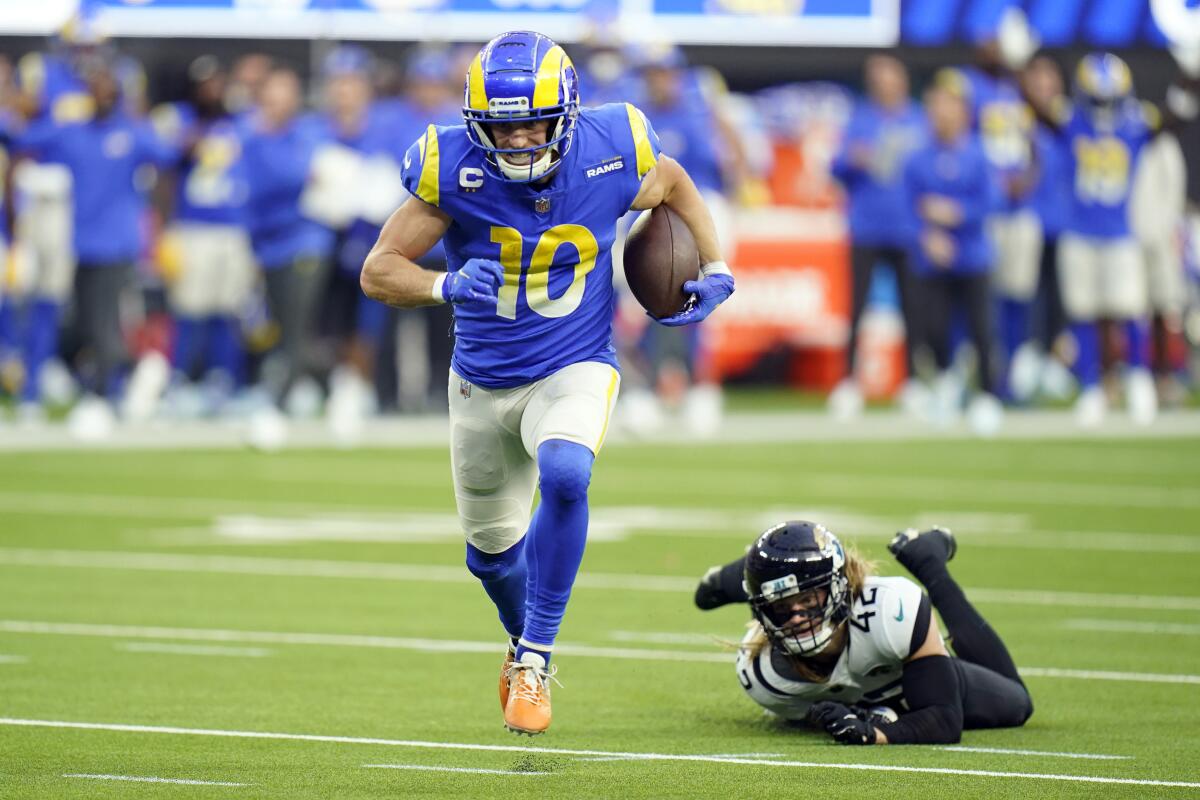 Rams wide receiver Cooper Kupp runs past Jacksonville Jaguars safety Andrew Wingard to score a touchdown.