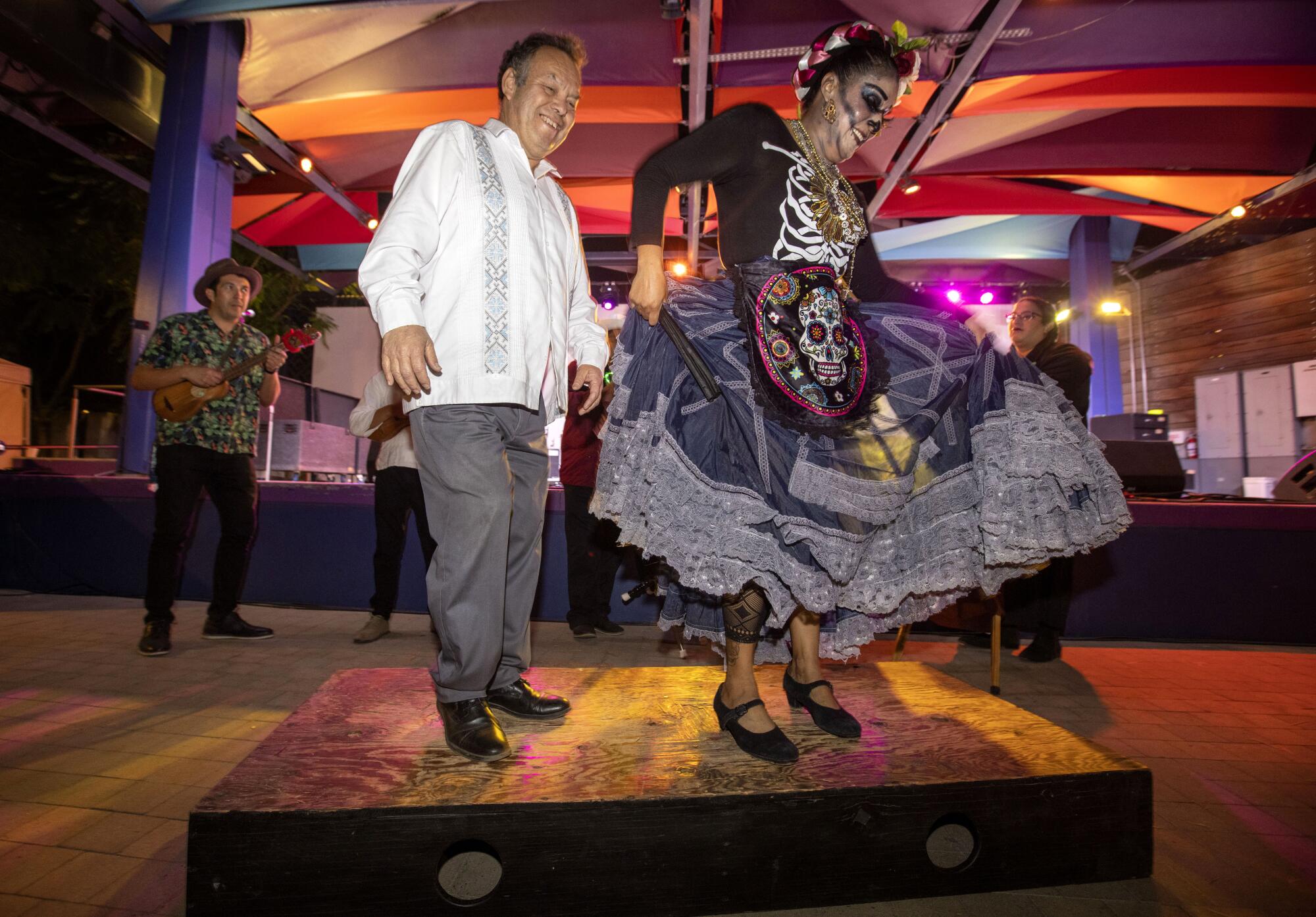 Luis Garcia dances with Delilah Vasquez during the Fandango at the end of the event.