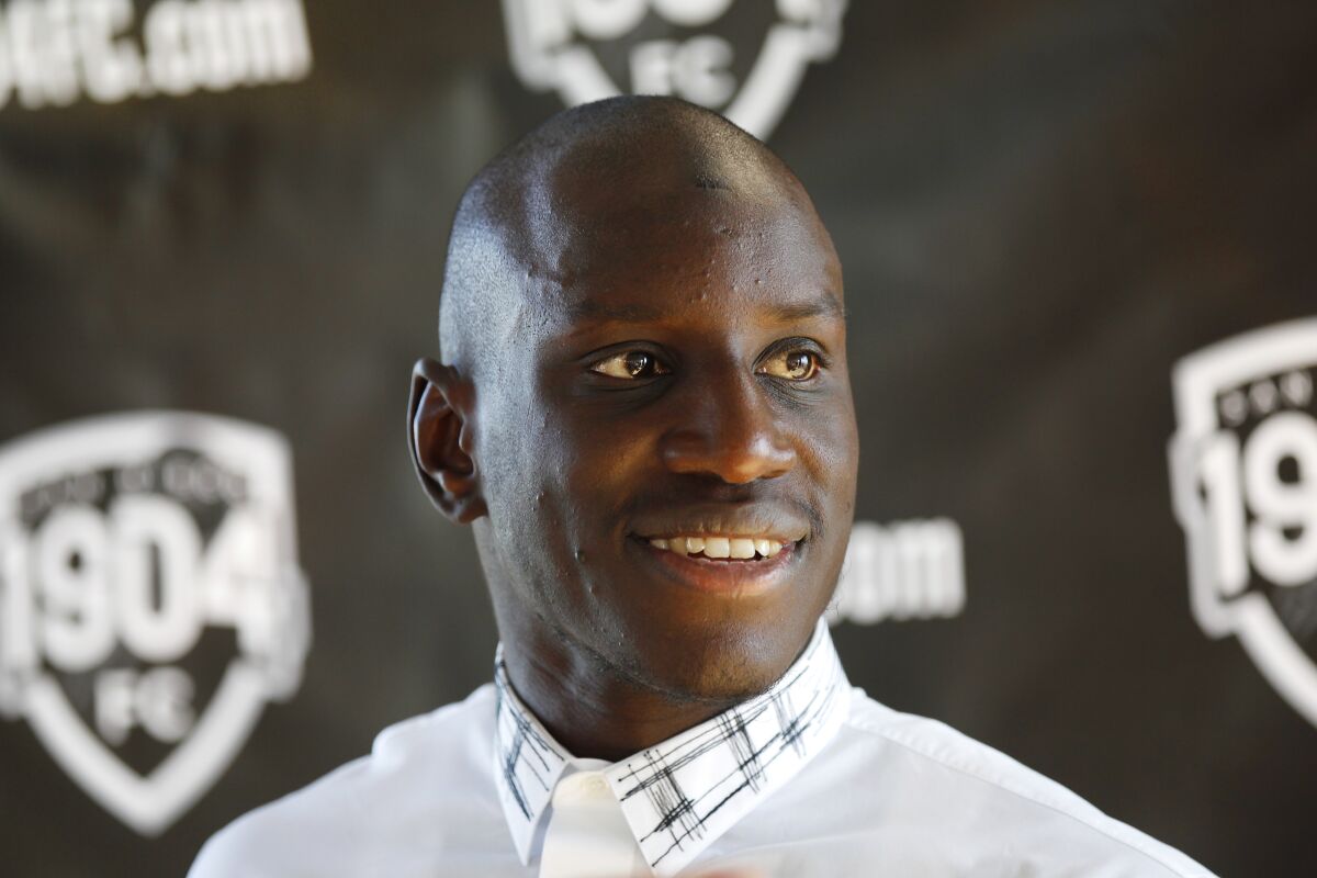 Demba Ba is the owner of San Diego's 1904 Football Club, shown at the team's introductory press conference in 2017.