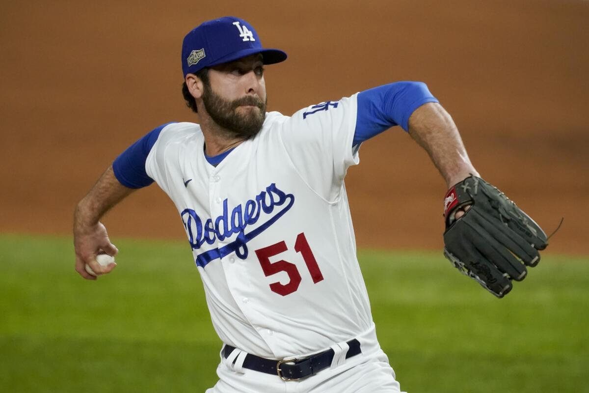 Dodgers relief pitcher Dylan Floro throws against the Atlanta Braves during the NLCS in Arlington, Texas.