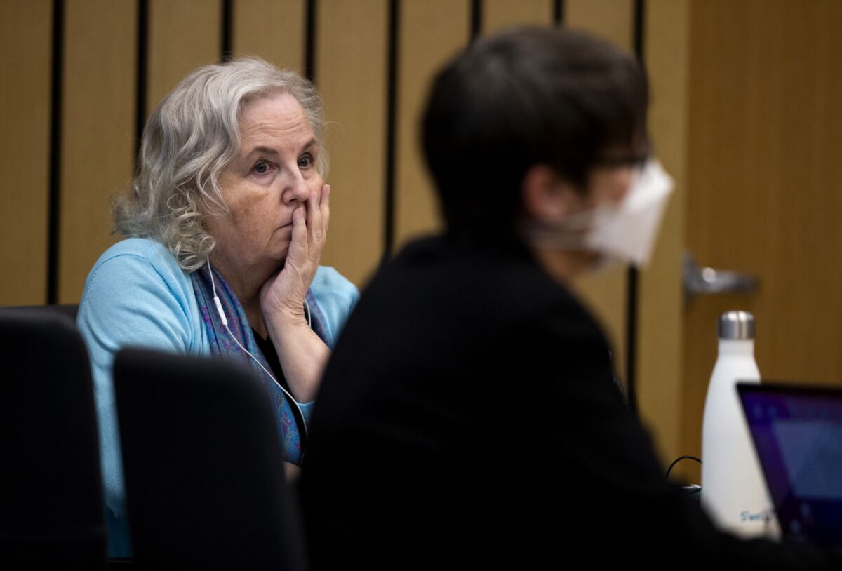 FILE - Romance writer Nancy Crampton Brophy, left, accused of killing her husband, Dan Brophy, in June 2018, watches proceedings in court in Portland, Ore., on April 4, 2022. She was sentenced Monday, June 13, 2022, to life in prison with the possibility of parole for murdering her husband. (Dave Killen/The Oregonian via AP, Pool, File)
