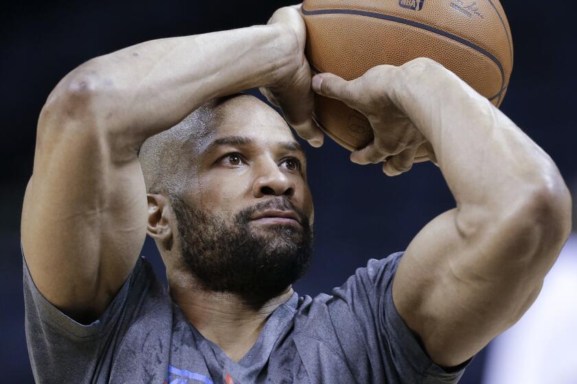 Derek Fisher shoots during a Oklahoma City Thunder practice session in April. Fisher reportedly is set to become the next head coach of the New York Knicks.