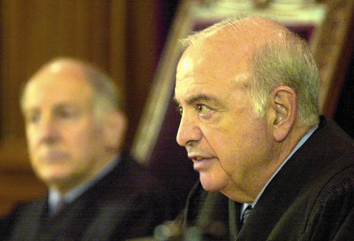 California State Supreme Court Justice Marvin R. Baxter, right, is shown in 2002. He is considered the most conservative member of the court.
