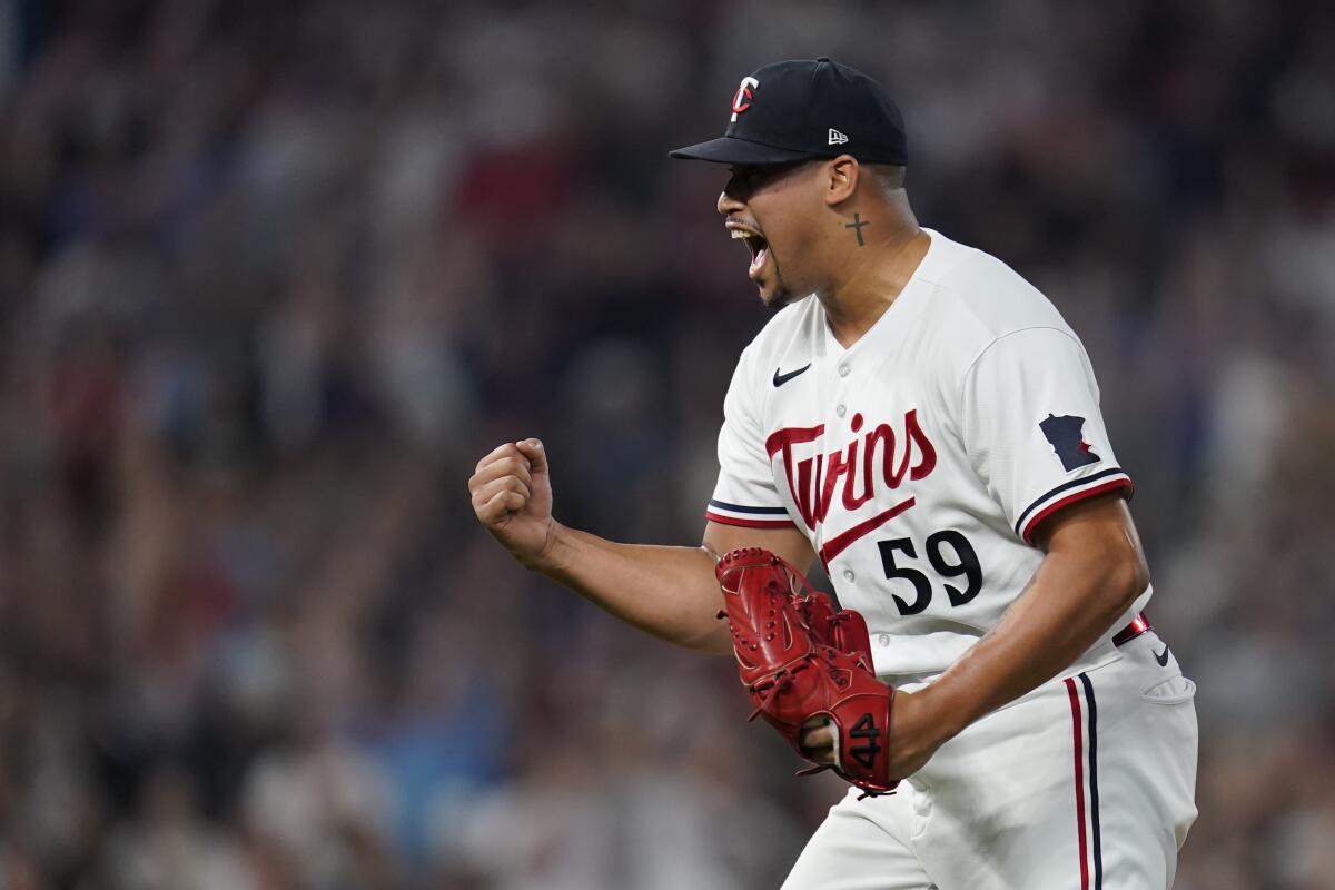 Twins hold on to beat Angels 8-6 and clinch AL Central title - The