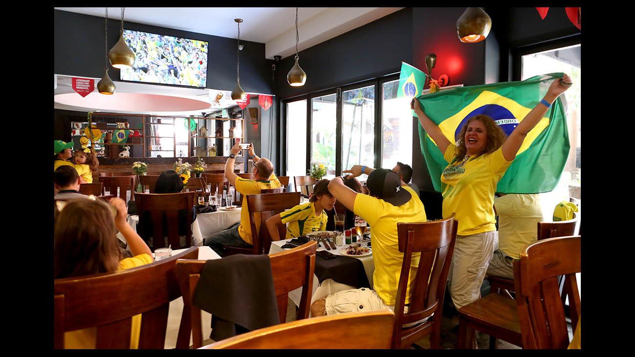 Photo Gallery: Local crowd cheers Brazil to advance in World Cup play