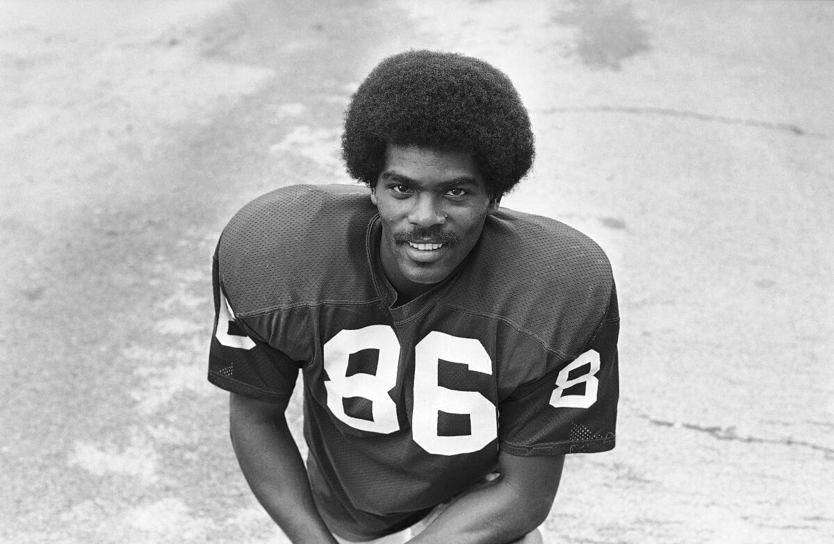 St. Louis Cardinals football player Marlin Briscoe smiles at the camera