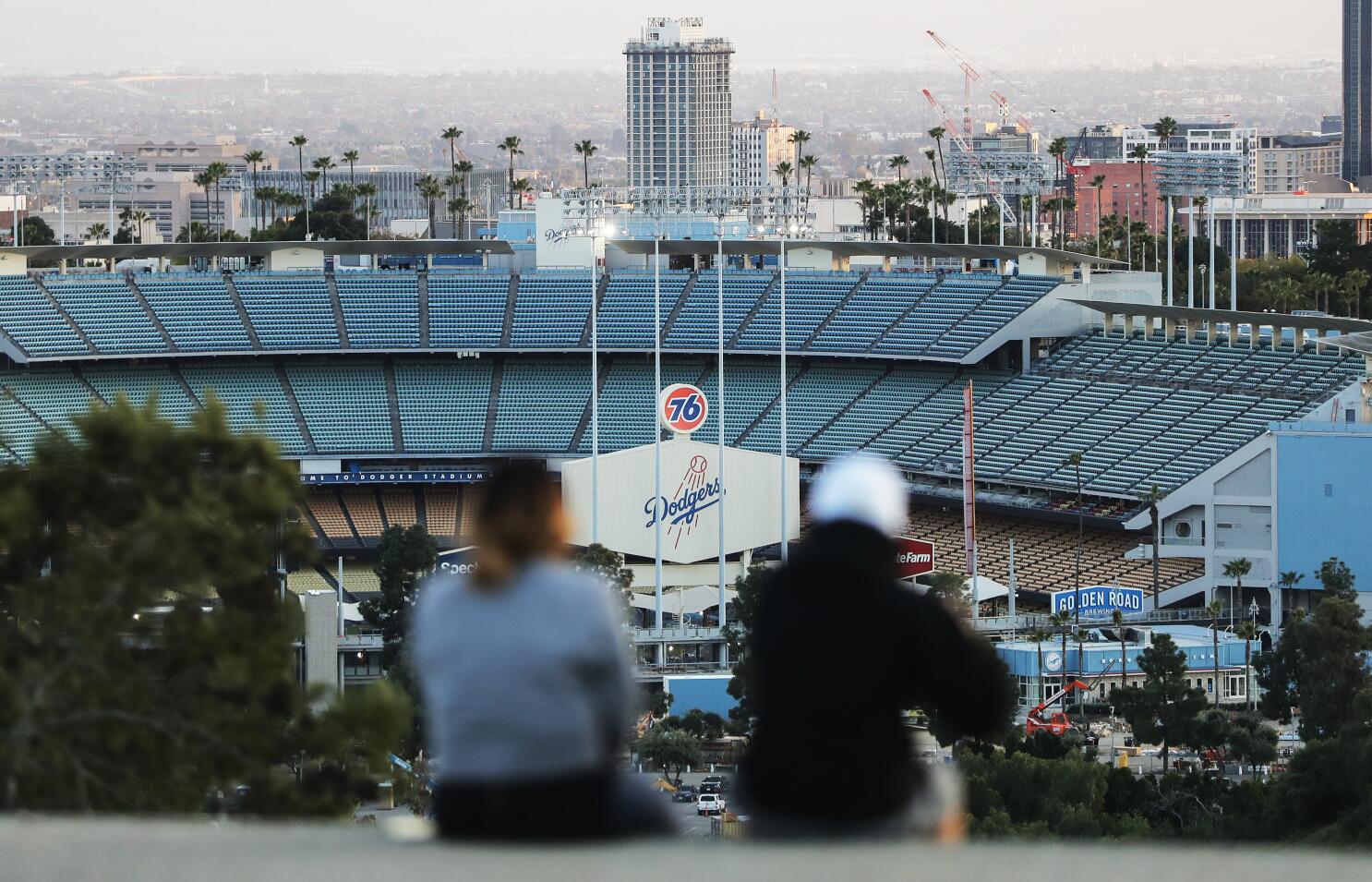 MLB: Fans outside Dodger Stadium 'feel the energy from a distance