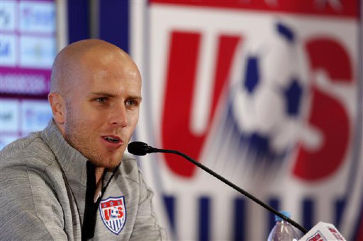 Michael Bradley talks during a press conference before a training session in Sao Paulo, Brazil on June 20, 2014.