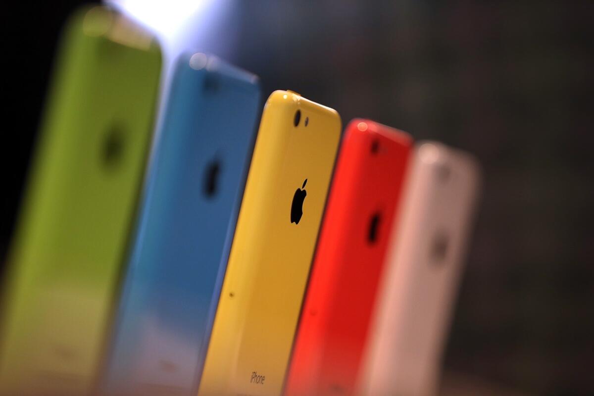 Apple's iPhone 5c will be available Friday for $27 with a two-year contract from Wal-Mart.