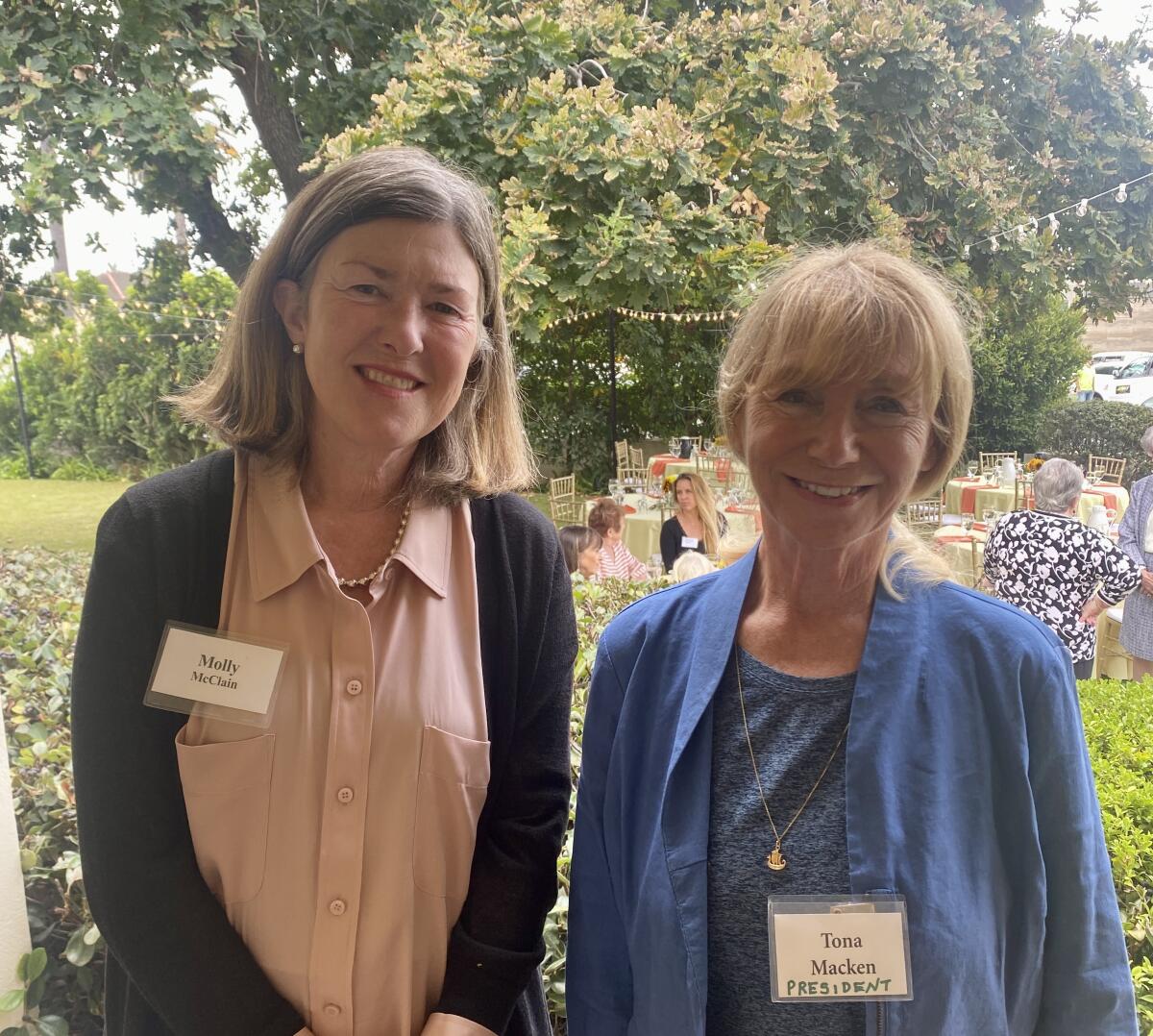 Molly McClain and La Jolla Woman’s Club President Tona Macken attend the group's Oct. 11 luncheon.