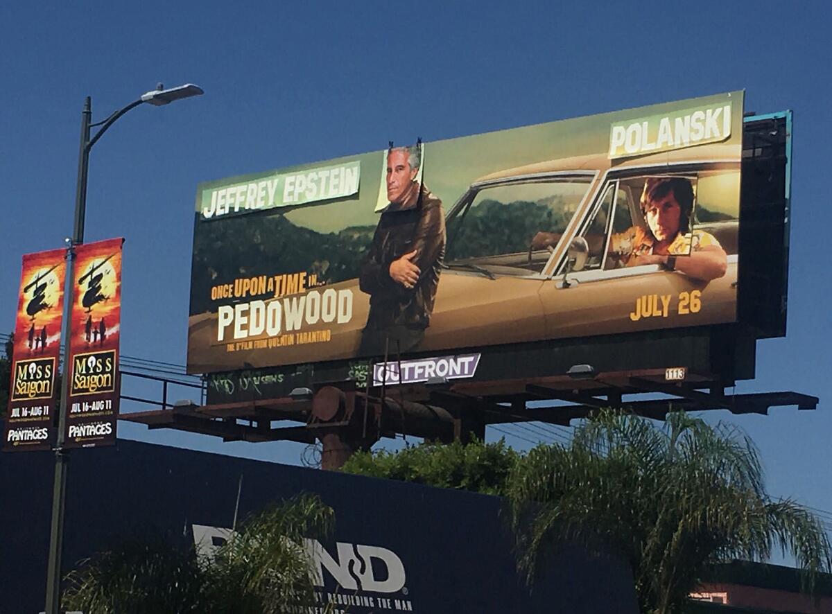 A billboard for "Once Upon a Time ... in Hollywood" altered by street artist Sabo.
