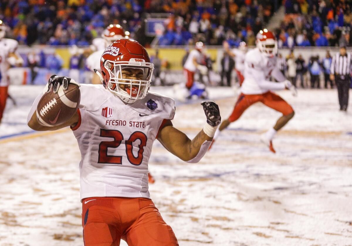 Fresno State running back Ronnie Rivers celebrates the game-winning touchdown against Boise State in overtime in the Mountain West championship game on Dec. 1, 2018 in Boise, Idaho.