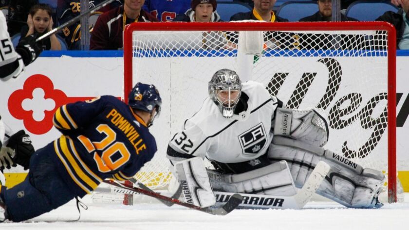 Buffalo Sabres Jason Pominville (29) is stopped by Kings goalie Jonathan Quick (32) during the third period on Saturday.