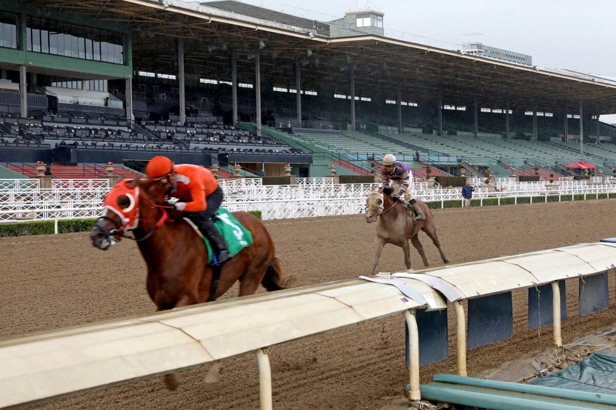 Kadesh, ridden by Abel Cedillo, wins the fourth race March 14 at Santa Anita on a day when the track was closed to fans because of the coronavirus.