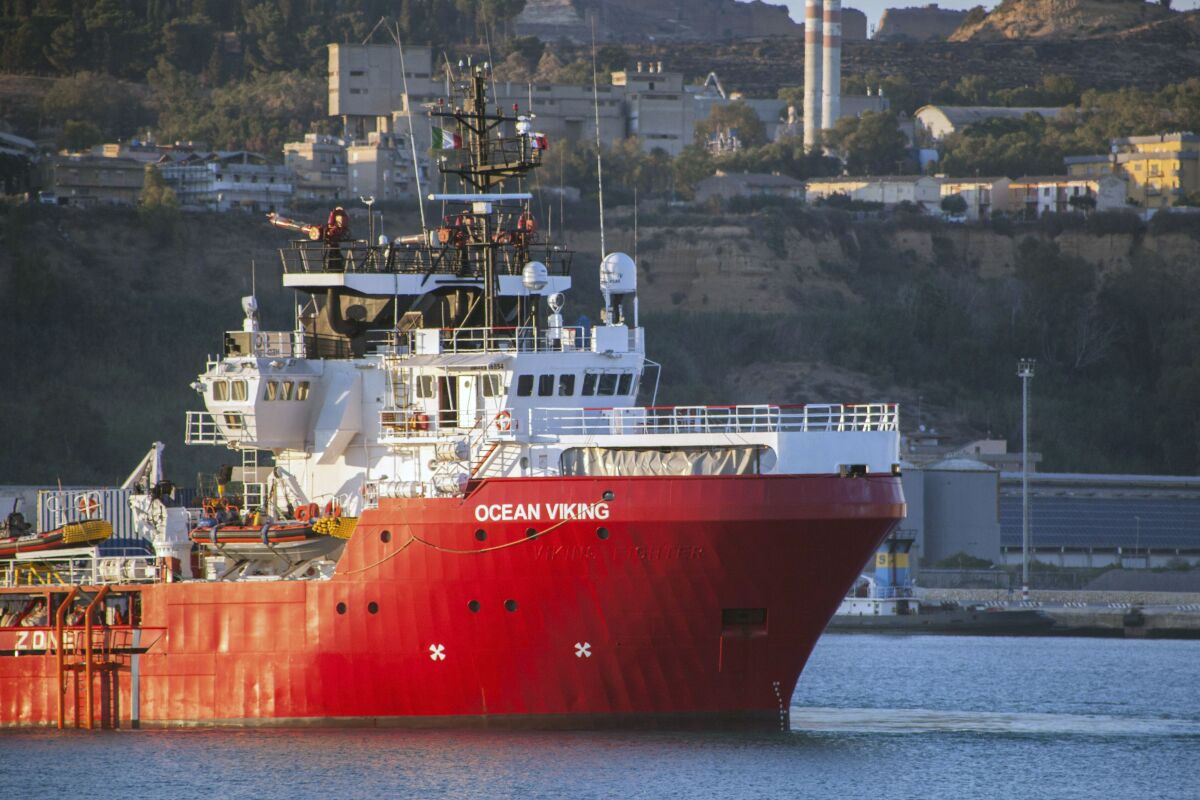 FILE - The Ocean Viking rescue ship is moored at Porto Empedocle harbor, southern Italy, on July 6, 2020. A charity operating a rescue ship with 306 migrants aboard says after days of waiting at sea Italy has assigned it a port of safety. SOS Mediterranee tweeted on Wednesday, Nov. 10, 2021 evening that those aboard Ocean Viking were feeling "indescribable relief" that Italian authorities granted permission of the migrants to be disembarked in Augusta, Sicily. (Fabio Peonia/LaPresse via AP)