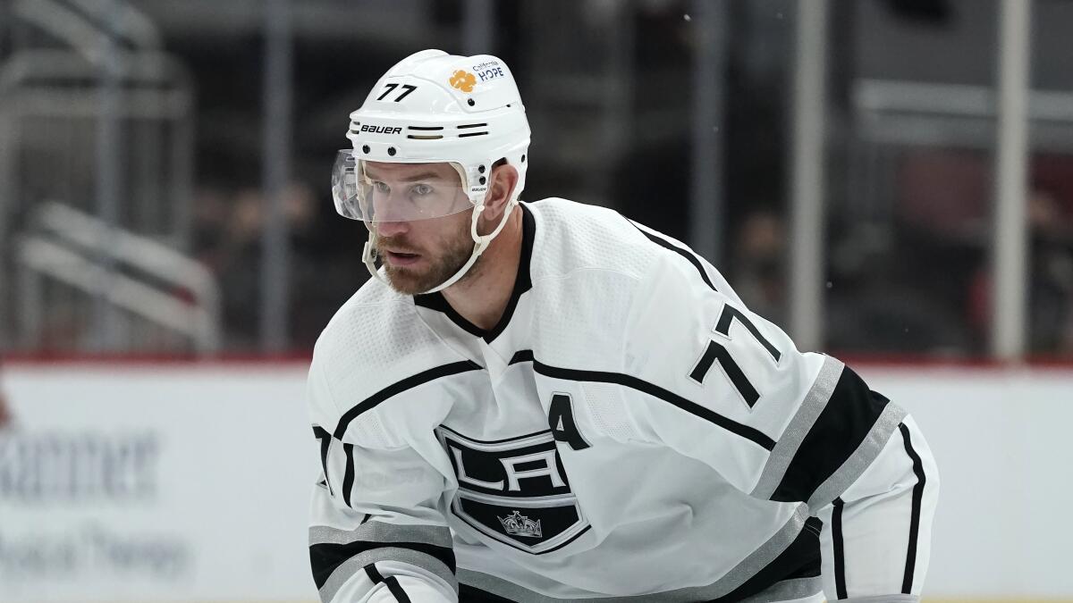 Kings center Jeff Carter skates to the puck against the Arizona Coyotes.