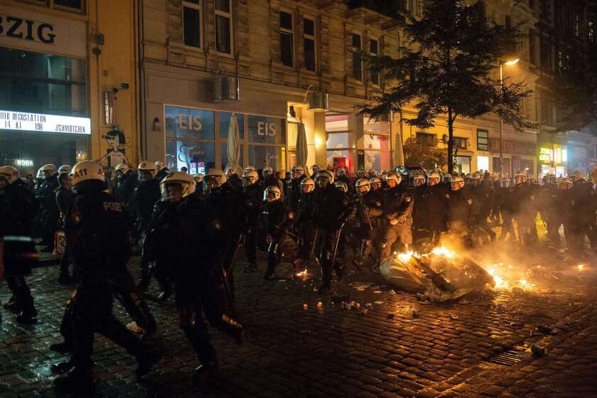 Riot police clash with far-right protesters in Hamburg, Germany, on Sept. 12.