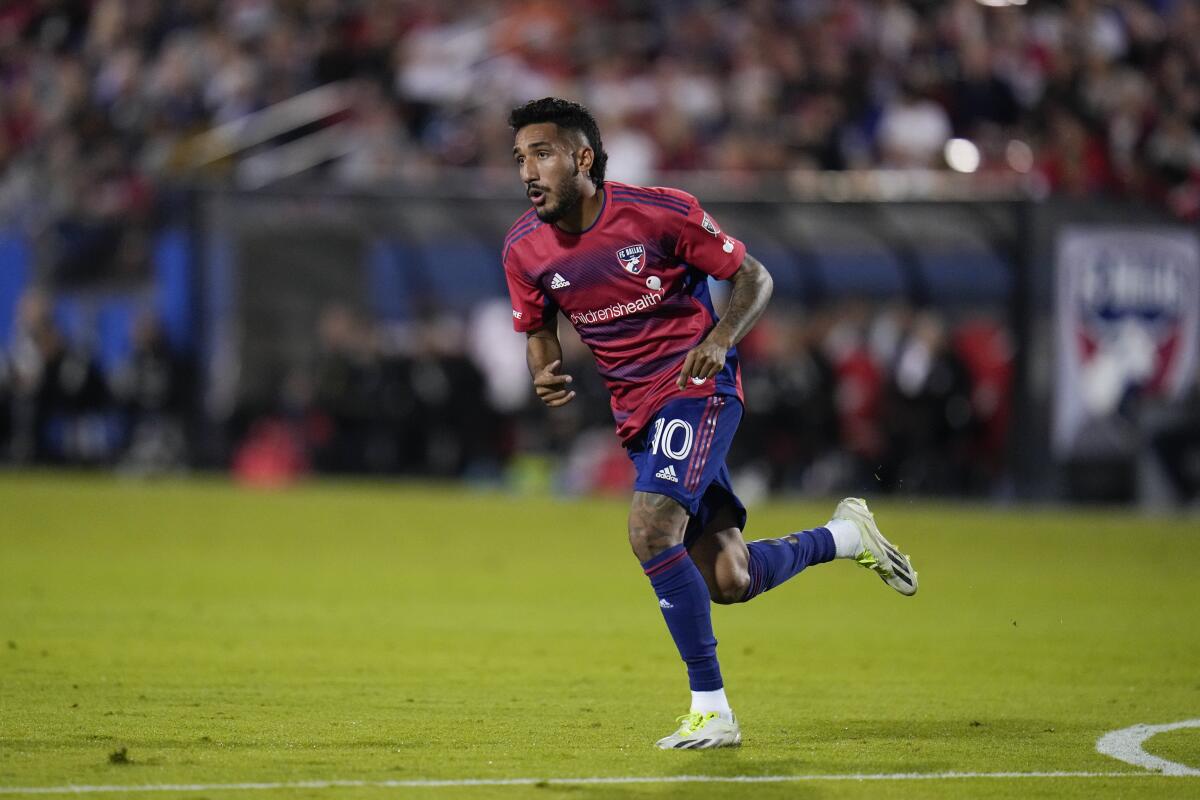 FC Dallas's Jesús Ferreira chases after the ball during a playoff match against the Seattle Sounders.