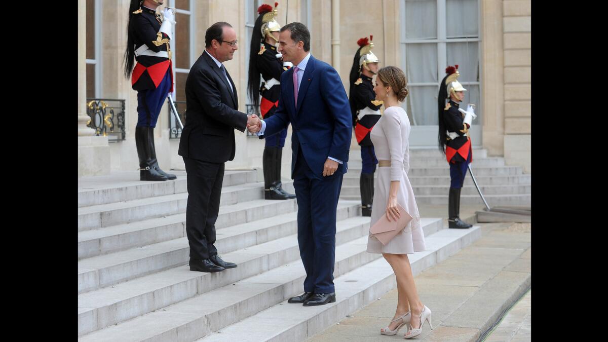 French President Francois Hollande, left, sees eye-to-eye with Spain's King Felipe VI, who visited Paris on Tuesday with Queen Letizia.