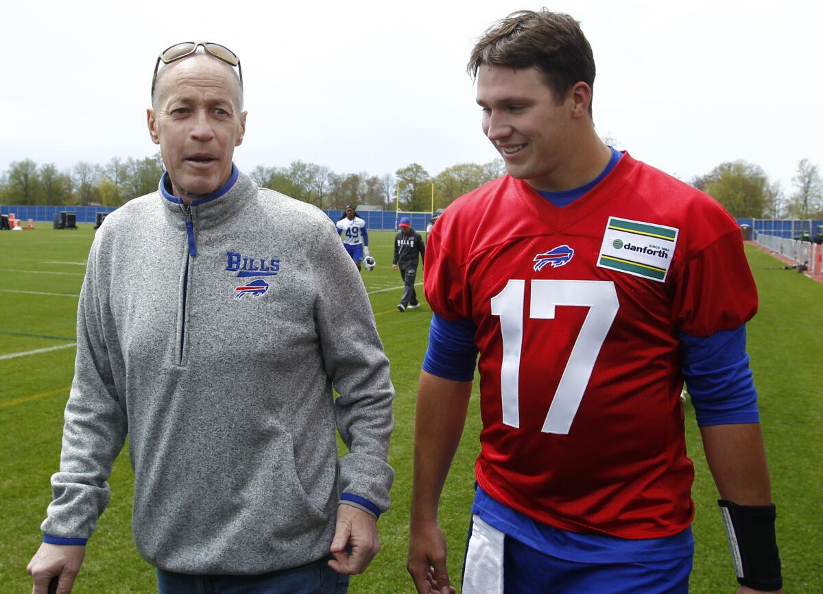 Josh Allen (17) meets Hall of Fame quarterback Jim Kelly at camp in 2018. 