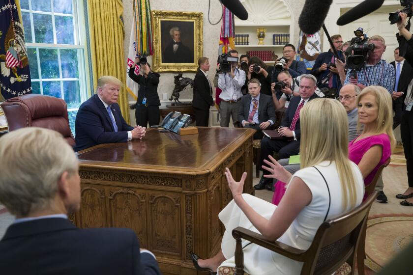 Ivanka Trump, second from left, the daughter and assistant to President Donald Trump, gives an update on Fentanyl and the opioid epidemic to President Donald Trump in the Oval Office of the White House in Washington, Tuesday, June 25, 2019. (AP Photo/Alex Brandon)