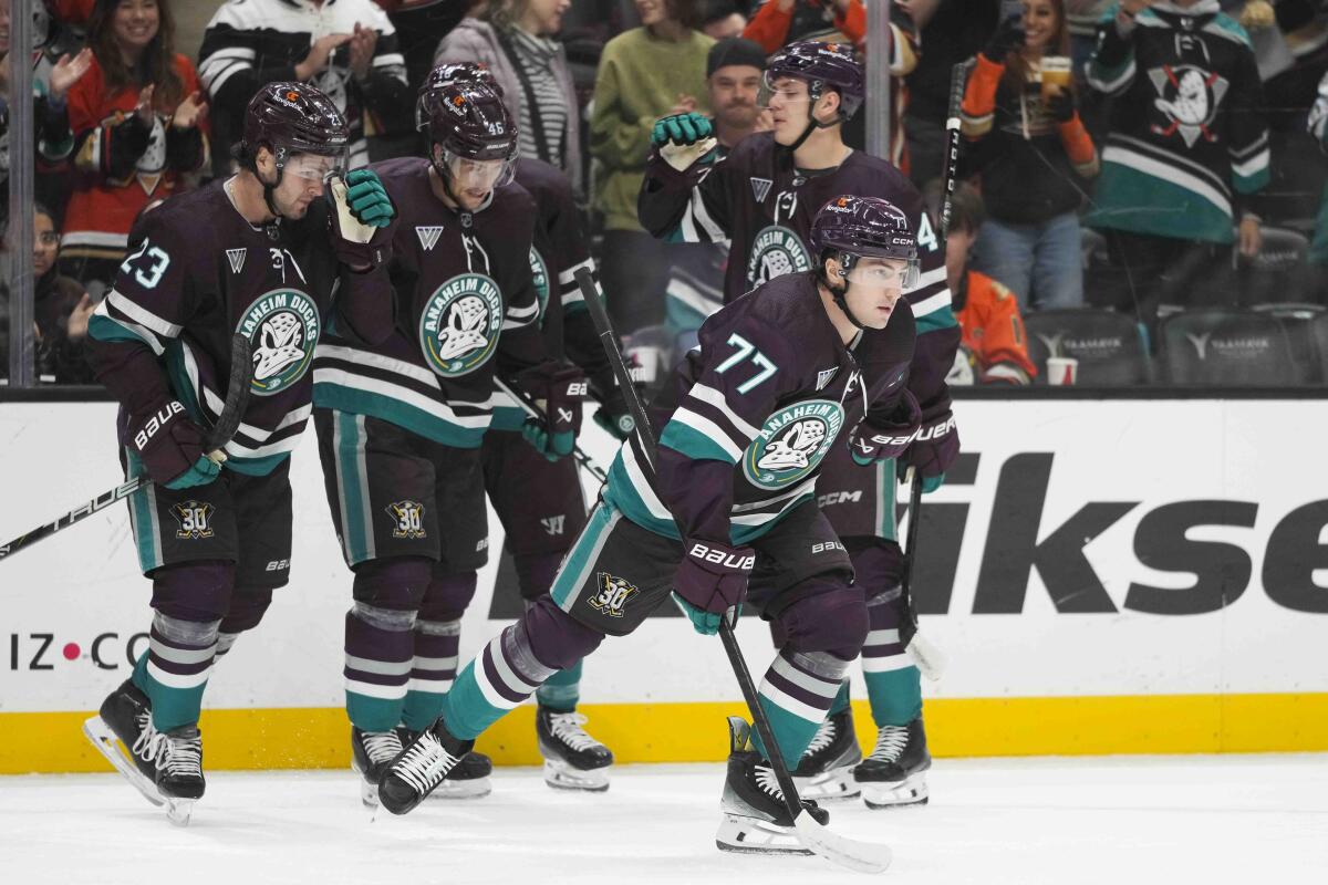 Ducks forward Frank Vatrano skates toward the bench after scoring a goal in the first period.