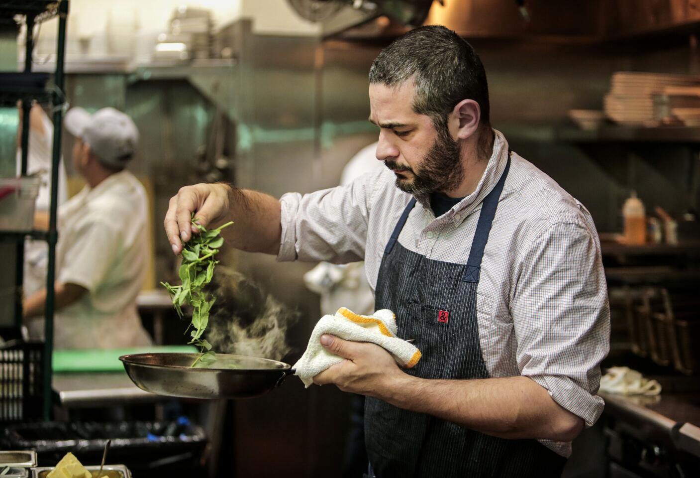 Chef Jeremy Fox of Rustic Canyon in Santa Monica is focusing on making dishes with ingredients that are more sustainable. Here, Fox prepares McGrath Family Farms broccoli di cicco.