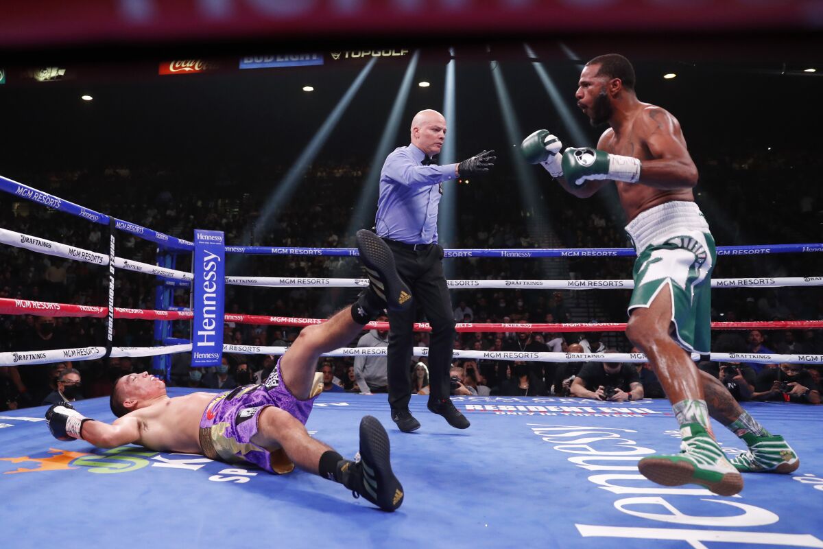 Anthony Dirrell knocks down Marcos Hernandez during their super middleweight fight.