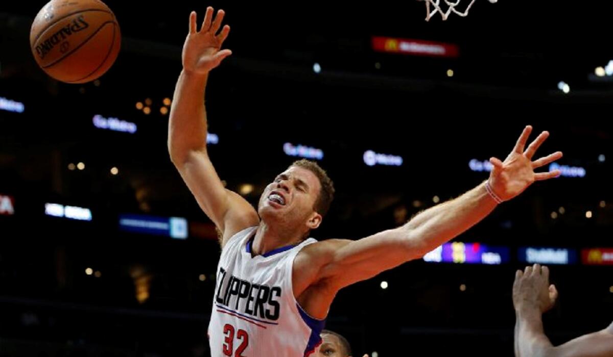 Clippers forward Blake Griffin loses the ball out of bounds as he is fouled on an attempt to drive to the basket.