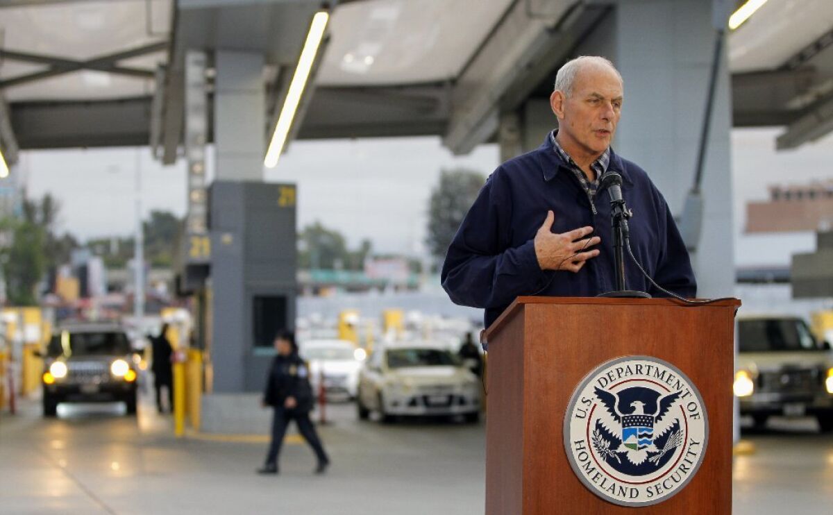 With cars entering the United States from Mexico as his backdrop, Homeland Security Secretary John Kelly spoke about immigration issues at a news conference Friday at the San Ysidro Port of Entry.
