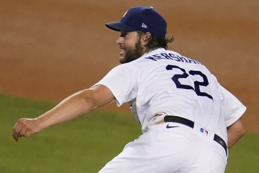 Los Angeles Dodgers starting pitcher Clayton Kershaw follows through on a pitch during the sixth inning.