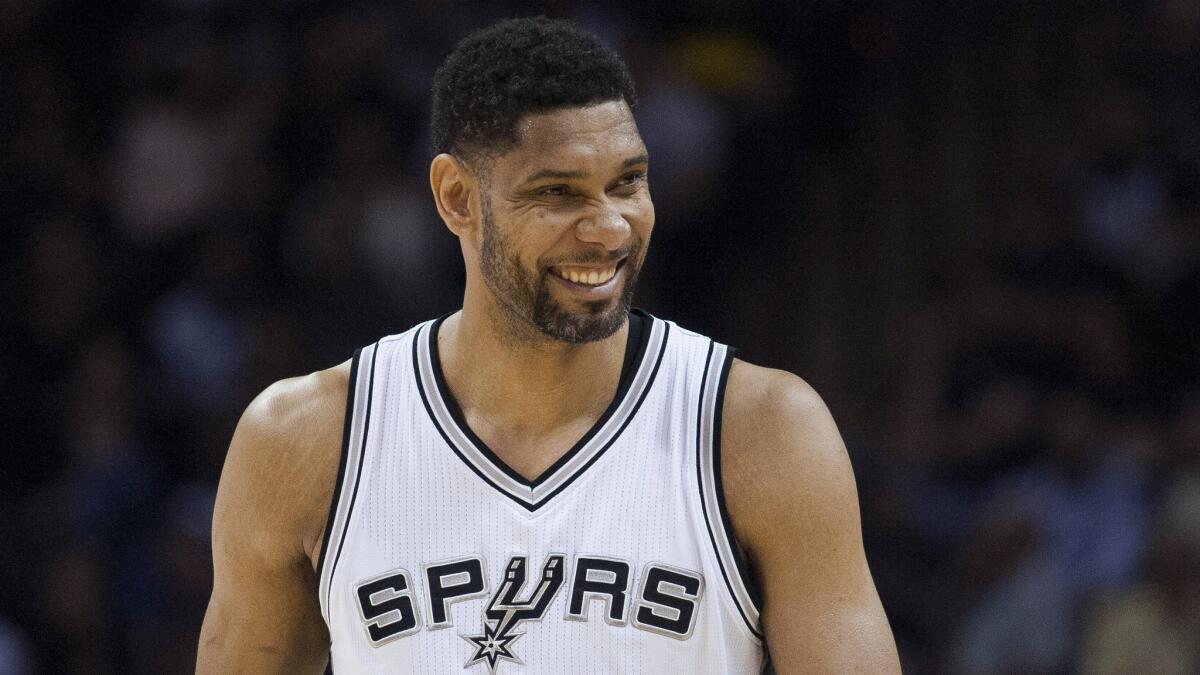 San Antonio Spurs star Tim Duncan smiles during a win over the Golden State Warriors on April 5.