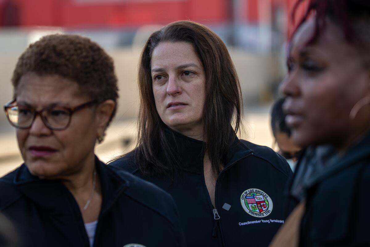 Mayor Karen Bass, left, and Councilmember Katy Young Yaroslavsky visit an encampment at 6th and Fairfax on February 16.